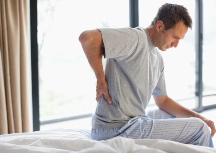 how to sleep with back pain