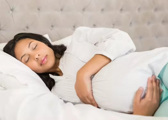 how should a woman sleep