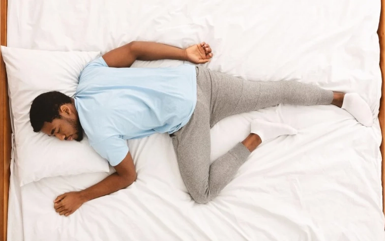 best sleep position for men