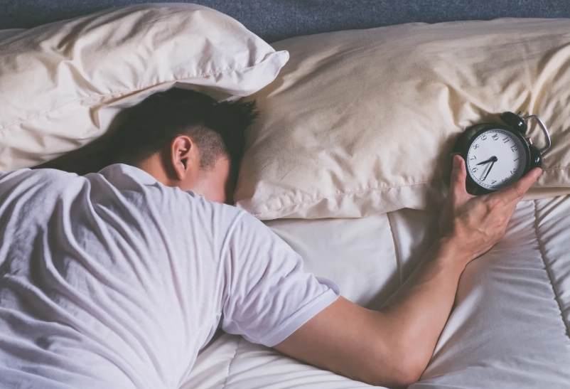 Does waking up and going back to sleep make you more tired